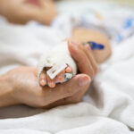 image-mother-holding-a-baby-hand