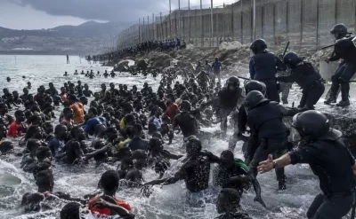 60 min miqrantın hücumu İspaniyanı çıxılmaz şok duruma saldı