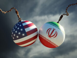image-wrecking-balls-textured-with-american-and-iranian-flags-over-dark-stormy-sky